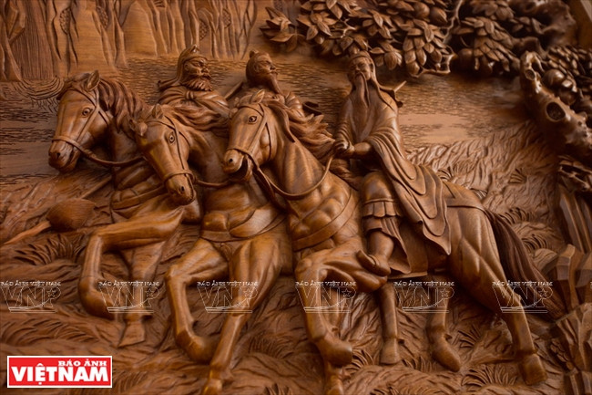 «Trois amis dans le jardin de pêchers». Photo: Nguyên Luân