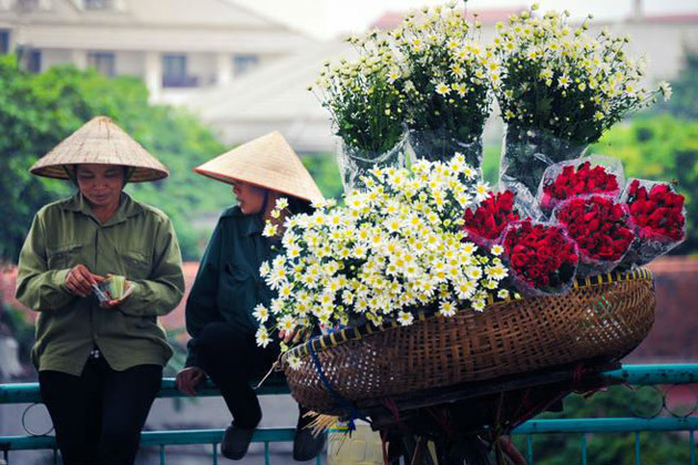 L’image de ces vélos ​chargés de fleurs ​​font partie de l'histoire de Hanoi.