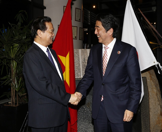 ...et ses homologues japonais Shinzo Albe,