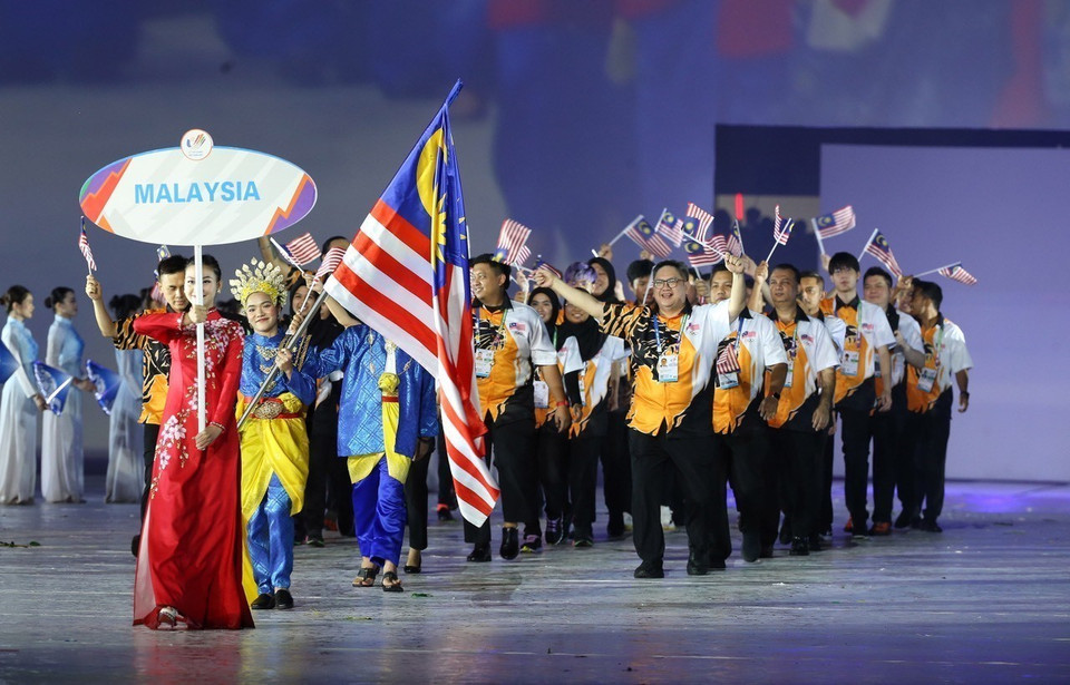  Défilé de la délégation de Malaisie. Photo : VNA