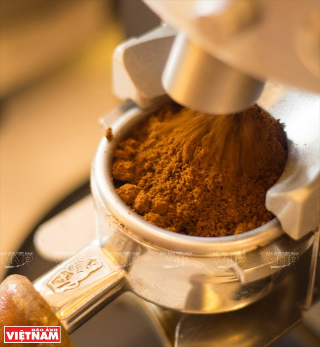 Un moulin à café de L’amant Café.