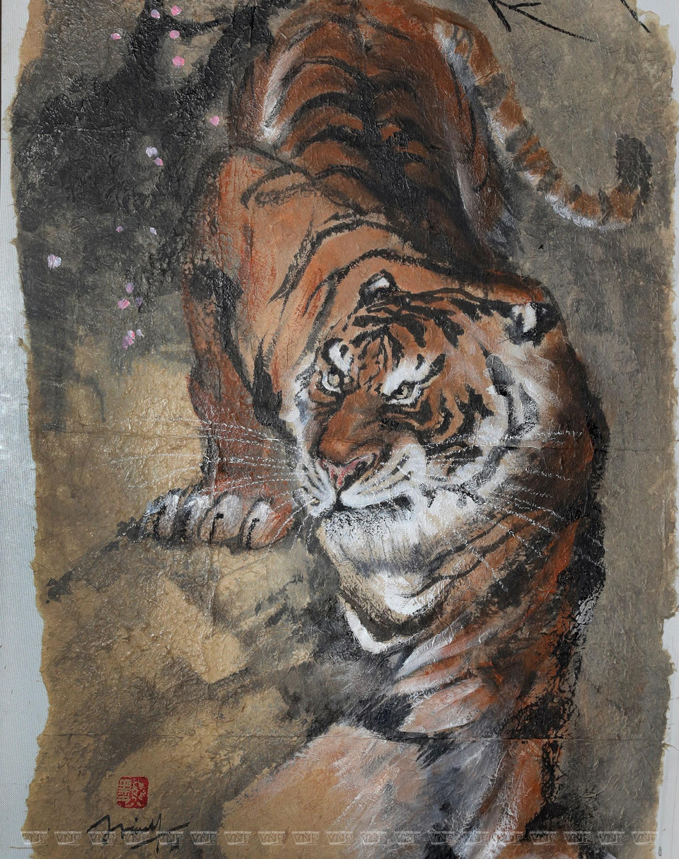 L'adresse, la méticulosité ainsi que la créativité artistique du peintre se manifestent de manière cohérente dans ses œuvres et les expressions sur le visage de chaque tigre semblent toucher le fort intérieur de l'homme . Photo: VNP