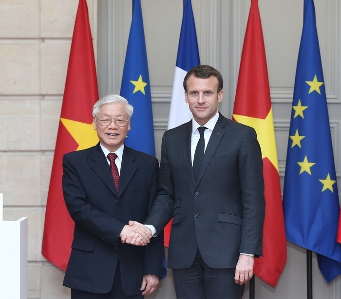 Le président français Emmanuel Macron a reçu le 27 mars 2018 le secrétaire général du Parti communiste et président du Vietnam, Nguyen Phu Trong, en visite officielle du 25 au 27 mars 2018 en France. Photo: VNA