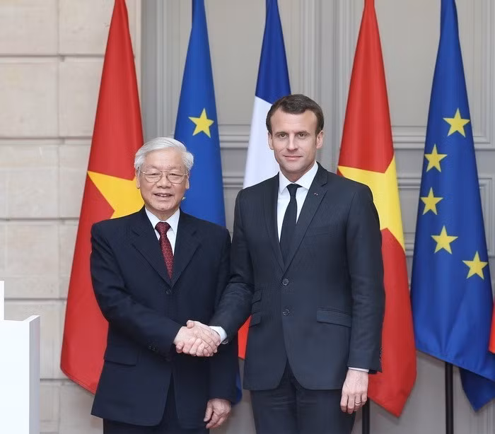 Le président français Emmanuel Macron a reçu le 27 mars 2018 le secrétaire général du Parti communiste et président du Vietnam, Nguyen Phu Trong, en visite officielle du 25 au 27 mars 2018 en France. Photo: VNA