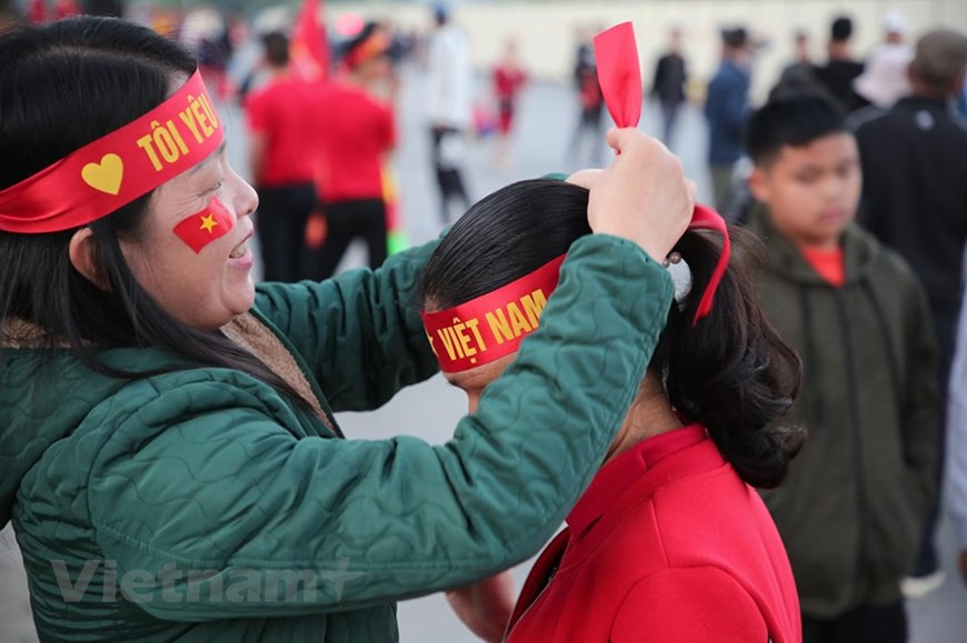 avec la conviction de la victoire. Photo: Vietnam+