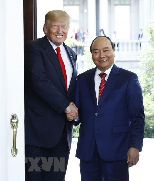 Le président américain Donald Trump et le Premier ministre Nguyen Xuan Phuc le 31 mai 2017, lors de la visite officielle du PM vietnamien du 29 au 31 mai aux Etats-Unis. Photo: Thong Nhat/VNA