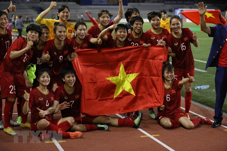 Les Vietnamiennes expriment leur joie après le match. Photo: VNA