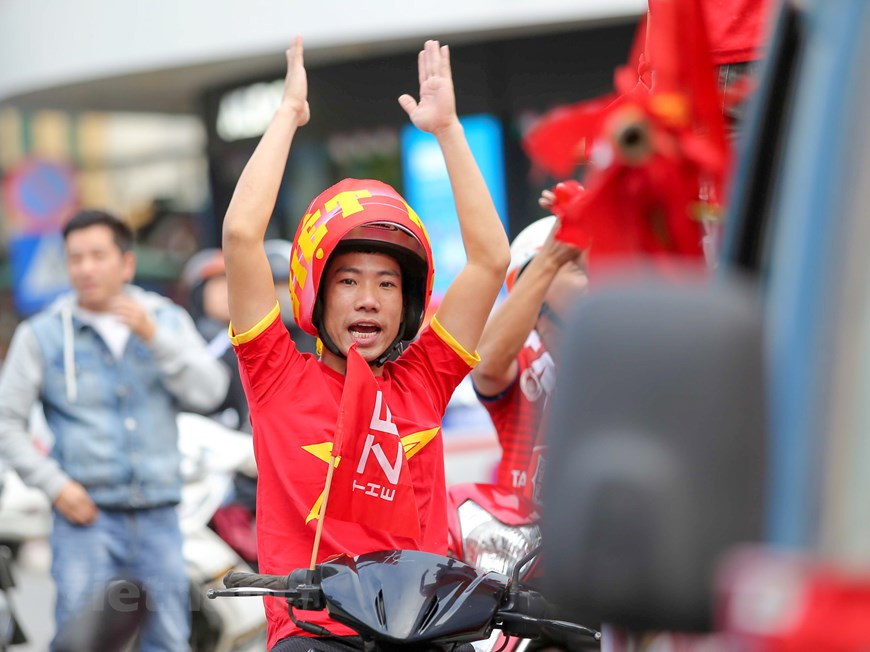 La foule toute entière scandait le slogan “Viet Nam vo dich” (Le Vietnam est le champion). Photo: Vietnam+