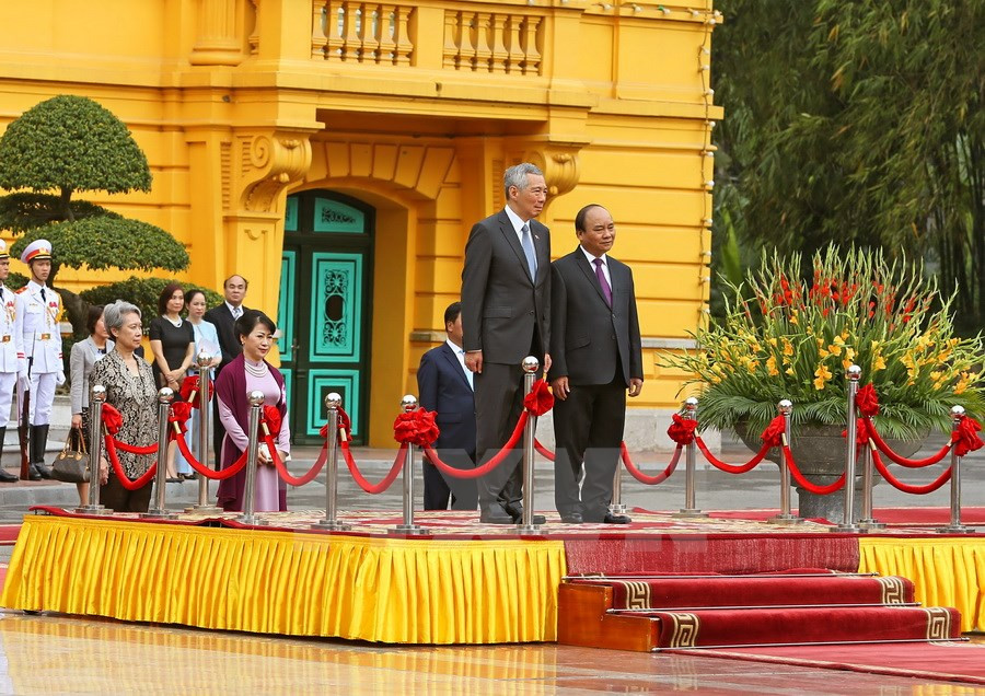 Cérémonie d'accueil officielle du Premier ministre singapourien Lee Hsien Loong.