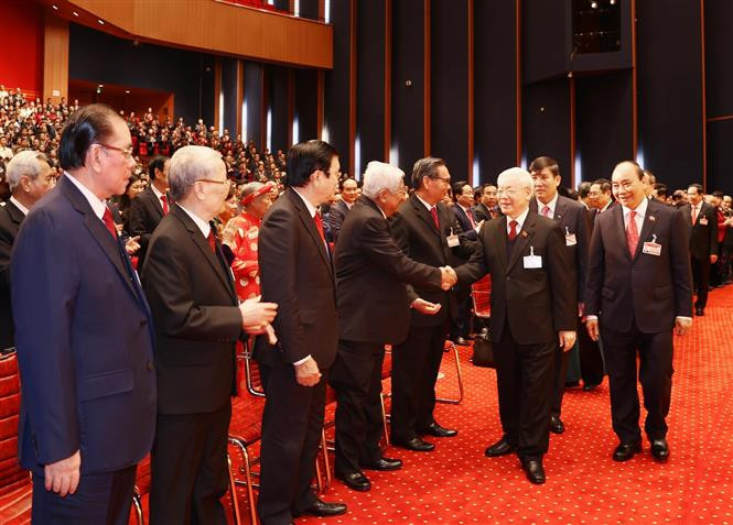Le secrétaire général du Parti et président du Vietnam, Nguyen Phu Trong et le Premier ministre Nguyen Xuan Phuc participent à la cérémonie d'ouverture du Congrès. Photo: VNA