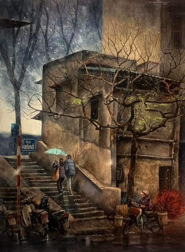 Un coin de la rue Nguyen Thiep avec un soupçon de couleur rose de la fleur de pêcher lors des jours à l'approche du Têt traditionnel.