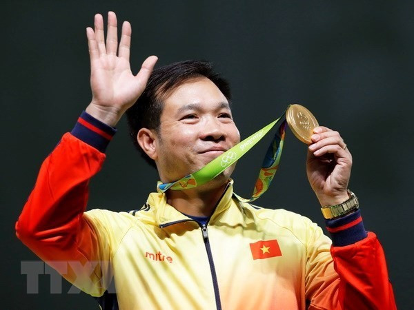 En remportant l'épreuve de pistolet à 10 mètres aux Jeux olympiques d'été de 2016 à Rio de Janeiro, Hoang Xuan Vinh devient le premier Vietnamien champion olympique. Photo : VNA