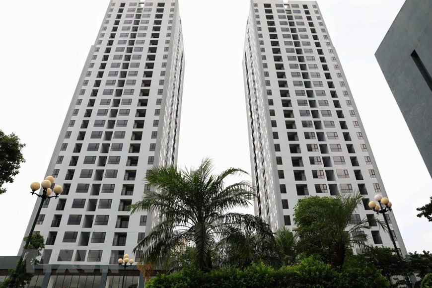 La distance entre les bâtiments de la zone de réinstallation X2 Dai Kim, est assez éloignée, répondant aux exigences des autorités de Hanoï pour la transformation en centre de quarantaine et hôpital de campagne . Photo: VNA