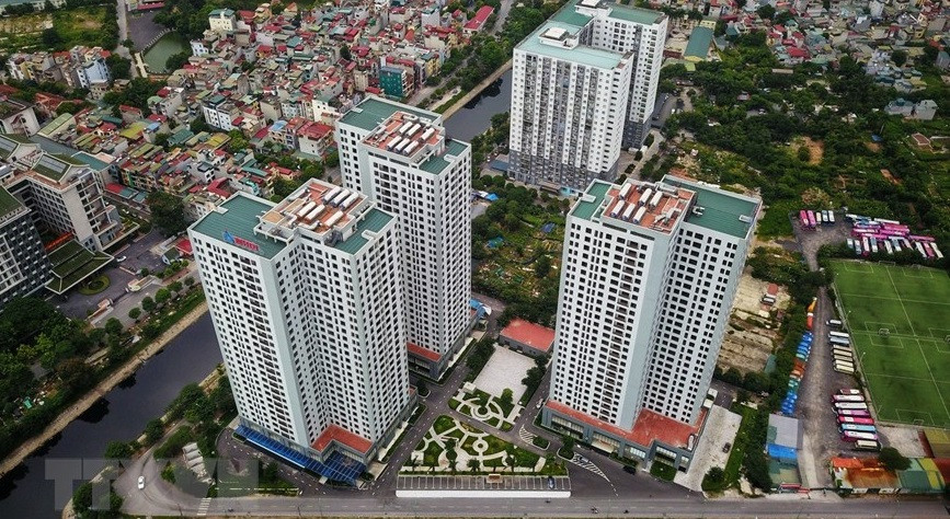 Des bâtiments dans la zone de réinstallation X2 Dai Kim, dans l’arrondissement de Hoang Mai, d’une superficie de plancher de 20.000 m² et dotés d'infrastructures synchrones, sont transformés en un hôpital de campagne et en centres de quarantaine concentrés. Photo: VNA