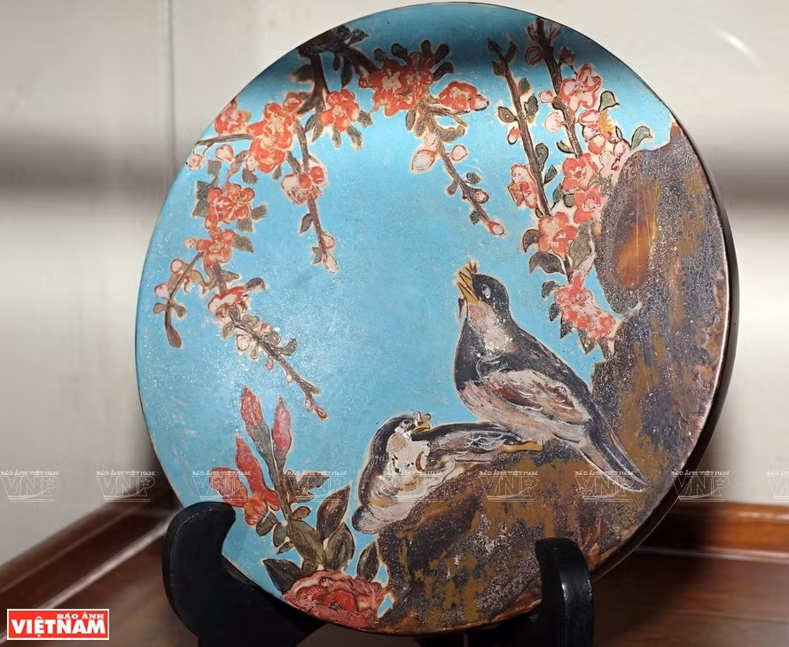 Une œuvre de estampe folklorique de Dong Ho en laque sur différents matériaux. Photo: Vietnam Illustré