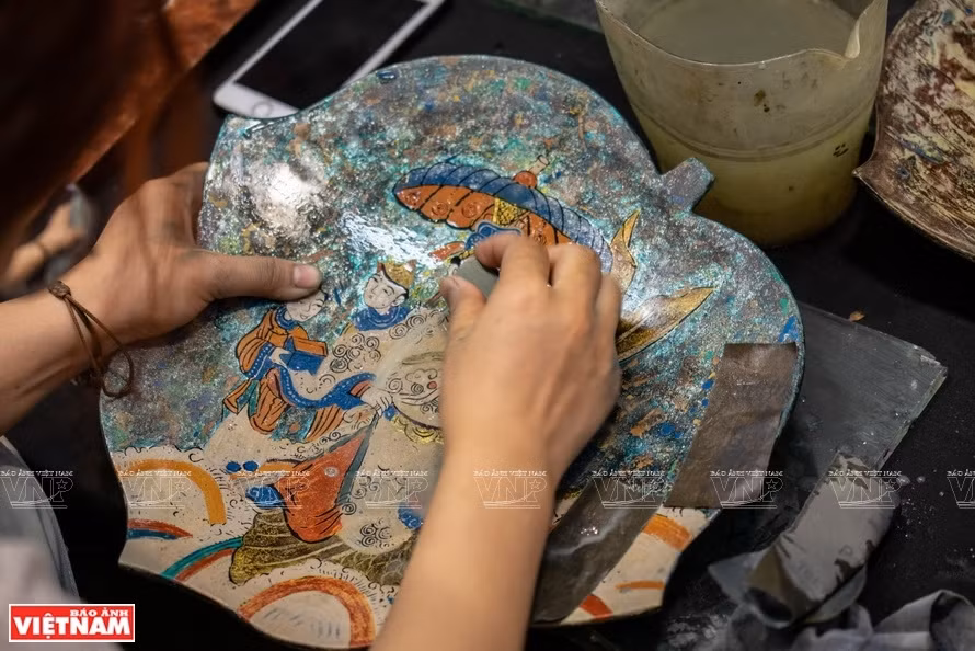 Une peinture folklorique de Hang Trong sur laque. Photo: Vietnam Illustré