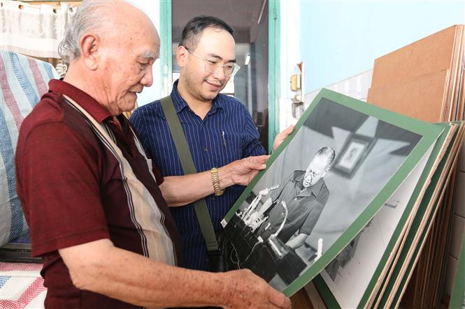 Le photographe Minh Lôc. Photo: VNA