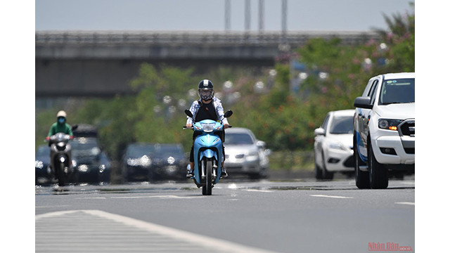 Rue Vo Nguyên Giap sous la chaleur étouffante.