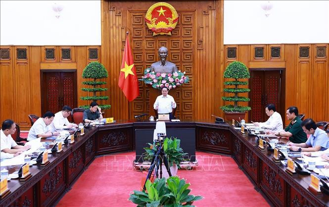 Le Premier ministre Pham Minh Chinh s’exprime lors de la réunion, à Hanoi, le 22 juillet. Photo: VNA