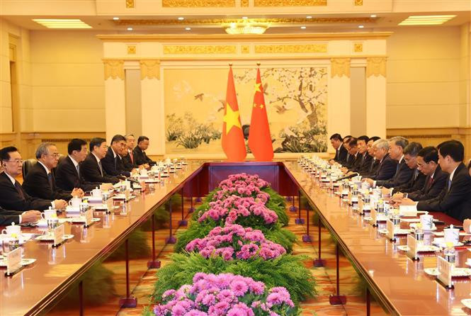 Entrevue entre le secrétaire général et président vietnamien Tô Lâm et le président de la Conférence consultative politique du peuple chinois, Wang Huning, à Pékin, le 19 août. Photo: VNA