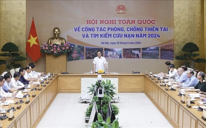 Le vice-Premier ministre Trân Luu Quang s’exprime lors de la conférence nationale sur la prévention et la lutte contre les catastrophes naturelles, la recherche et le sauvetage, à Hanoi, le 10 mai. Photo : VNA