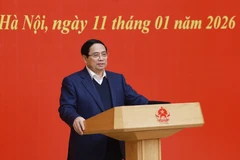 Le Premier ministre Pham Minh Chinh, également membre du Bureau politique, secrétaire du Comité du Parti du gouvernement, préside la conférence. Photo: VNA