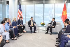 Panorama de la rencontre entre le président de la République, Luong Cuong, et la délégation de parlementaires de l’État de l’Oregon. Photo: VNA