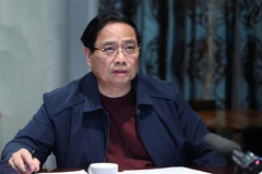 Le Premier ministre Pham Minh Chinh lors de la visioconférence. Photo: VNA