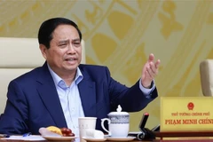 Le Premier ministre Pham Minh Chinh s'exprime lors de la réunion. Photo: VNA