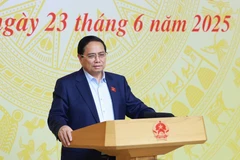Le Premier ministre Pham Minh Chinh s'exprime lors de l'événement. Photo: VNA
