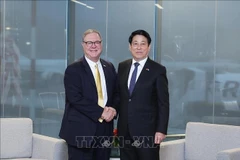 Le président de la République, Luong Cuong, et le vice-gouverneur de l’État de Washington, Denny Heck. Photo: VNA