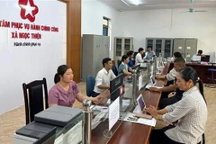 Au Centre de services administratifs publics de la commune de Ngoc Thien. Photo : VNA