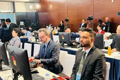 Des représentants internationaux assistent au 14e Congrès national du PCV au Centre national des congrès. Photo : VNA