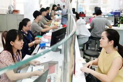 Les options concernant le personnel et les sièges des nouveaux quartiers et communes, prévus à partir du 1er juillet, ont été soigneusement préparées par Hô Chi Minh-Ville afin d'assurer un service fluide aux citoyens et aux entreprises. Photo: thanhnien.vn