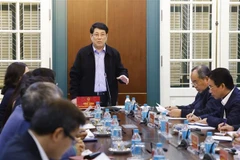 le président de la République, Luong Cuong (debout), lors de la séance de travail. Photo: VNA