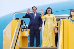 Le Premier ministre Pham Minh Chinh et son épouse. Photo: VNA