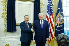 Le secrétaire général du Parti communiste du Vietnam, To Lam, et le président américain Donald Trump. Photo : VNA