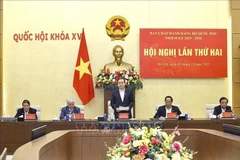 Le président de l’Assemblée nationale, Trân Thanh Man (debout), lors de l'événement. Photo: VNA