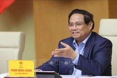 Le Premier ministre Pham Minh Chinh lors de la réunion. Photo: VNA