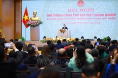 Le Premier ministre Pham Minh Chinh s'exprime lors de la conférence. Photo: VNA
