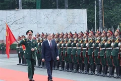 Le secrétaire général du Parti, To Lam, également secrétaire de la Commission militaire centrale, rend visite à la Région militaire 7. Photo: VNA