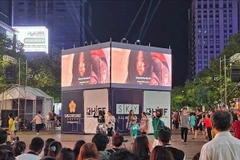 Un écran LED installé dans la rue piétonne Nguyen Hue (1er arrondissement) pour optimiser l'expérience cinématographique des habitants de Hô Chi Minh-Ville. Photo d'illustration