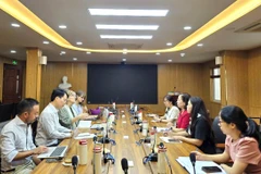 Séance de travail entre l'Association des agriculteurs du Vietnam et la FAO. Photo: hoinongdan.org.vn