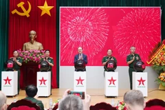 Lancement de l'édition en ligne en russe du journal Quân Dôi Nhân dân. Photo: VNA