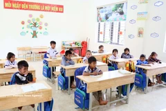 Des élèves de l'école K Ai dans la province de Quang Tri. Photo: VNA