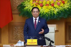 Le Premier ministre Pham Minh Chinh, président du Conseil central de l’émulation et des récompenses, préside le 20 octobre la 14ᵉ réunion du Conseil. Photo: VNA