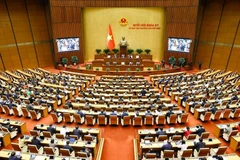 Une séance de travail dans le cadre de la 9e session extraordinaire de l’Assemblée nationale. Photo: VNA