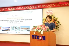 La directrice générale de la VNA, Vu Viet Trang s'exprime au colloque. Photo: VNA