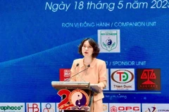 La vice-ministre de la Santé, Nguyen Thi Lien Huong s'exprime à la conférence scientifique. Photo: Vietnam+
