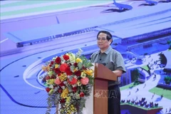 Le Premier ministre Pham Minh Chinh préside la mise en chantier et l’inauguration de 80 projets d’infrastructures importants. Photo: VNA